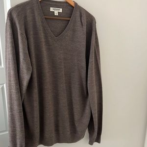 100% wool v neck sweater.
